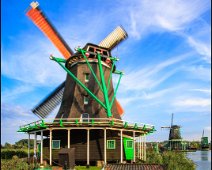 Zaanse Schans Mill De Zoeker View of the historic mill De Zoeker and two other mills in Zaanse Schans, Netherlands.