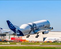 Airbus A330-743L Beluga XL departing in Hamburg Finkenwerder The Airbus A330-743L Beluga XL super freighter airplane for outsized cargo transport is departing on runway 23 in Hamburg Finkenwerder EDHI.