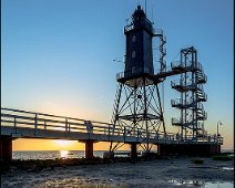 Leuchtturm Obereversand IV The historical lighthouse Eversand-Oberfeuer, 37,40 m high, build in 1886/87 on the norh sea coast in Dorum, Lower Saxony in Germany.