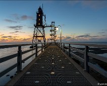 Leuchtturm Obereversand I The historical lighthouse Eversand-Oberfeuer, 37,40 m high, build in 1886/87 on the norh sea coast in Dorum, Lower Saxony in Germany.