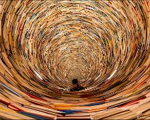 Prague Book Tunnel A view into the Prague Book Tunnel which is located in the Prague City Library. Hundreds of books and a clever mirror installation makes you think, that this...