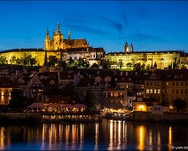 Prague Castle The historical Prague Castle and the Old Town of Prague at dawn. The River Moldau is in front. You can also see the St. Vitus Cathedral.