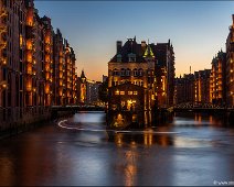 Poggenmühlenbrücke Speicherstadt Hamburg The view from Poggenmühlenbrücke in the famous Speicherstadt Hamburg towards the Wasserschloß at dawn, Unesco World Heritage